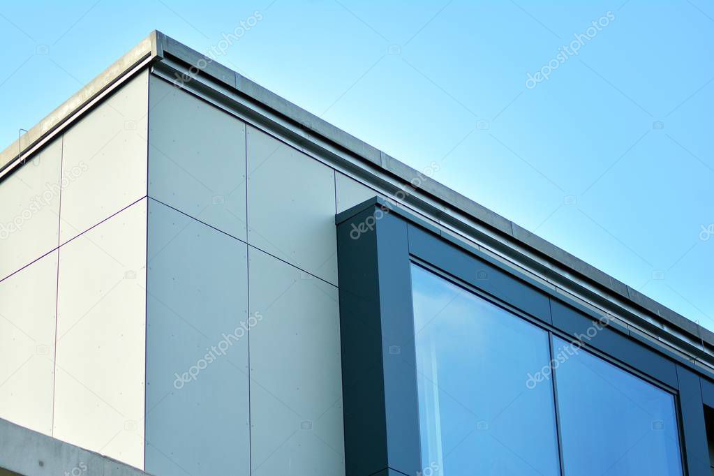 Sky reflected in a modern building glass facade