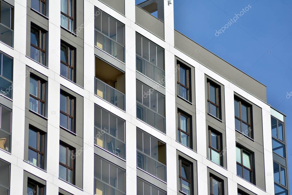 Modern, new executive apartments and with deep blue summer sky