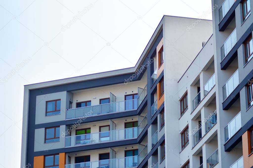 Fragment of a modern apartment building in front. Very modern apartment house.