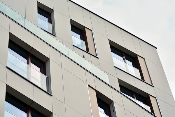 Fragment of a modern apartment building in front. Very modern apartment house.