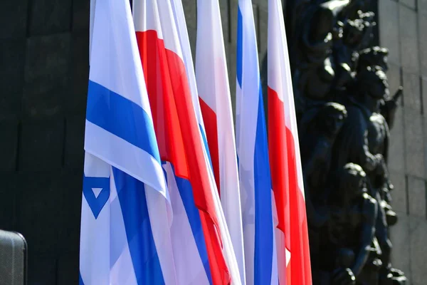 Poland and Israel flag waving in the wind. Israel and Poland two flags textile cloth.