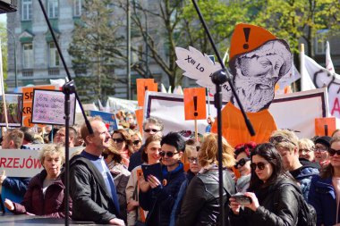 Warsaw, Poland. 23 April 2019. Several thousand teachers, as well as parents and students supporting them, protested, the 16th day of teachers protest. The main demonstration took place in front of the Ministry of Education in Warsaw. clipart