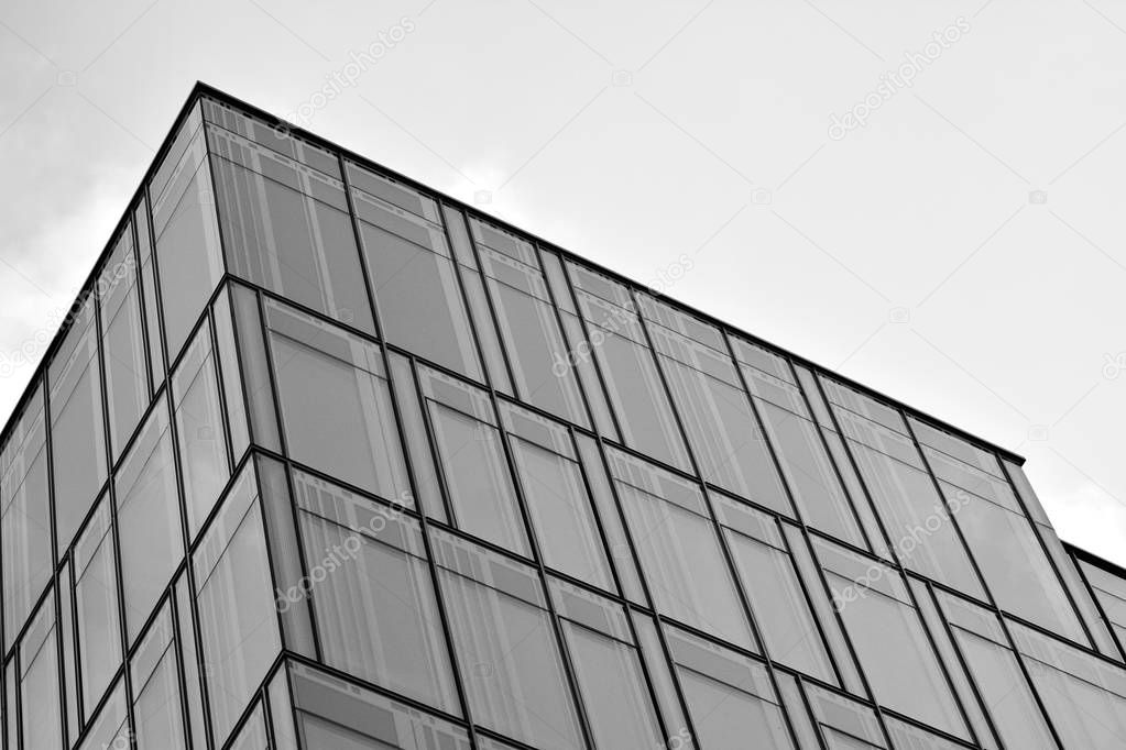 Glass walls of a office building - business background. Black and white.