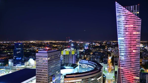 Modern office building at night. Night lights, city office building downtown, cityscape view.