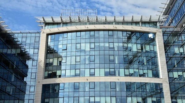 Panoramic and perspective wide angle view to steel light blue background of glass office building commercial modern city of future. Business concept of success industry tech architecture.