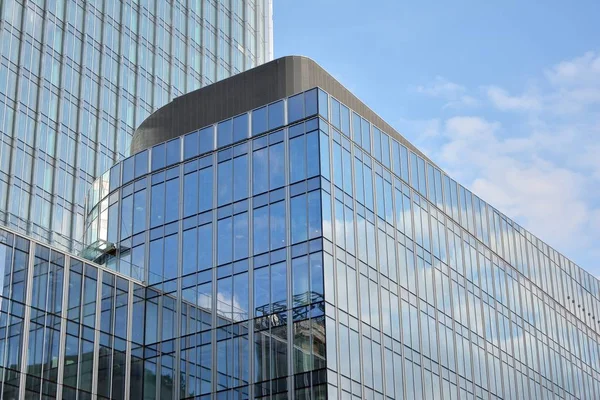 The windows of a modern building for offices. Business buildings architecture.