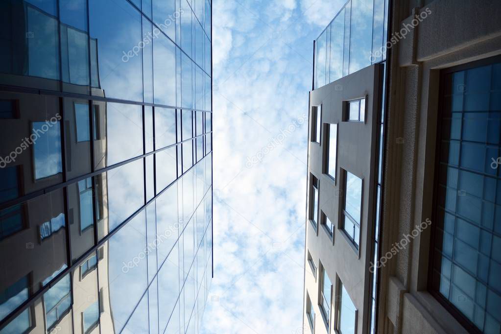 The windows of a modern building for offices. Business buildings architecture.