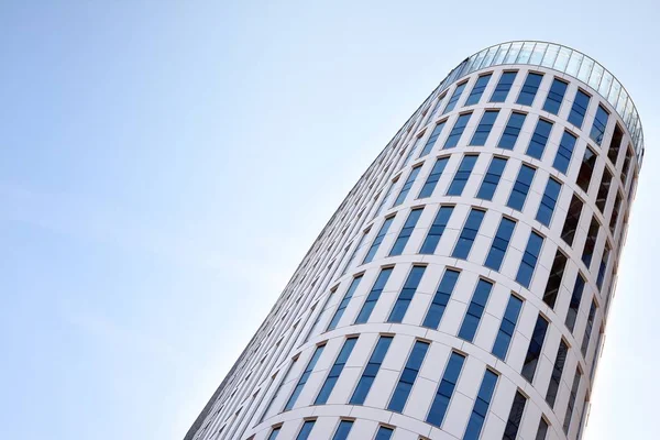 Panoramic and perspective wide angle view to steel light blue background of glass office building commercial modern city of future. Business concept of success industry tech architecture.