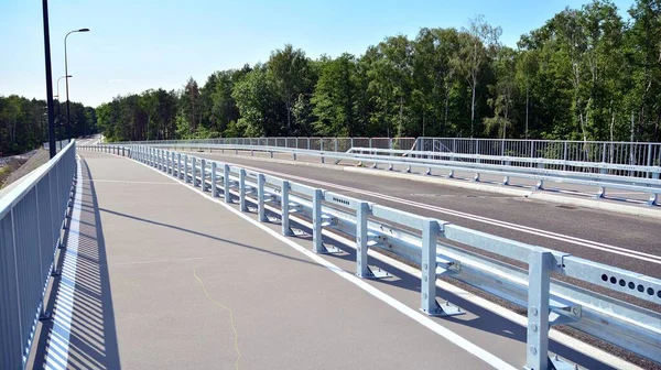 New construction of a crash barrier at a new highway