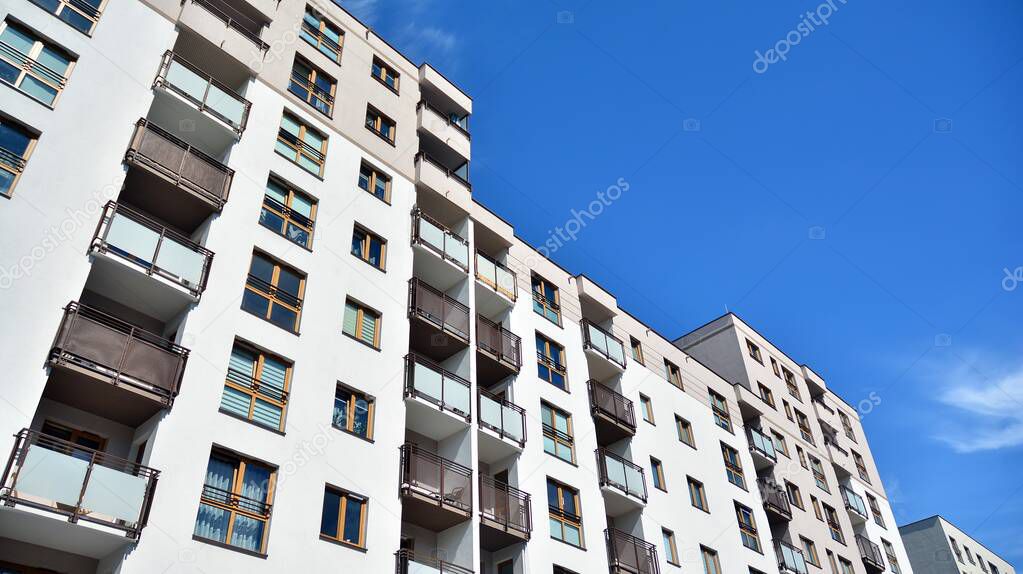 Modern apartment building. Balconies at apartment residential building. Residential architecture.