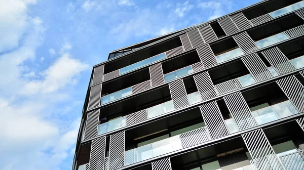 Estate property and condo architecture. Fragment of modern residential flat with apartment building exterior. Detail of new luxury home complex.