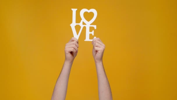 Cropped View Man Presenting Love Sign Isolated Yellow — Stock Video