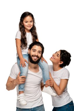 happy latin father carrying on shoulders cute daughter near happy wife isolated on white  clipart