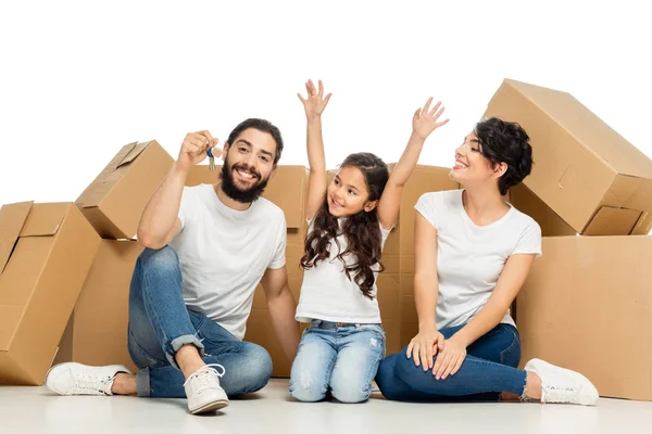 Feliz Niño Latino Gesto Mientras Mira Padre Sosteniendo Llaves Sentado — Foto de Stock