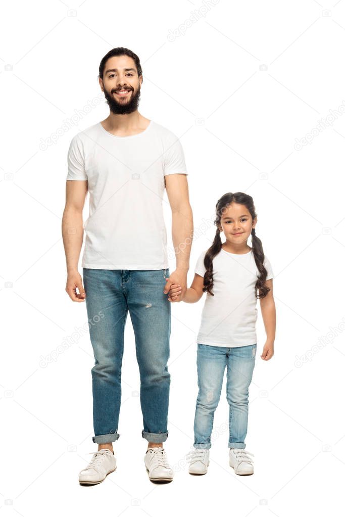 cheerful father holding hands with cute daughter isolated on white 