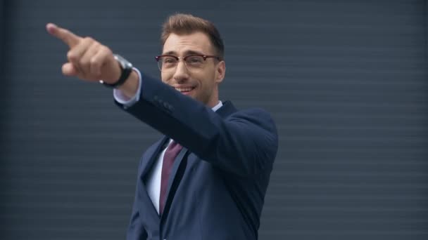 Businessman Pointing Finger Showing Thumbs Laughing Grey Wall — Stock Video