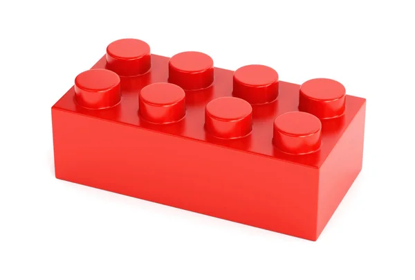 Rode plastic speelgoed bouwsteen op witte achtergrond — Stockfoto