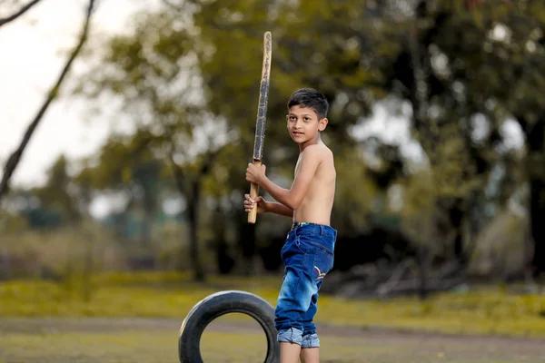 Rural Indian Child Playing Cricket — Stock Photo, Image