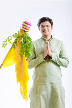 Gudi padwa marathi new year , young indian celebrating gudi padwa festival clipart
