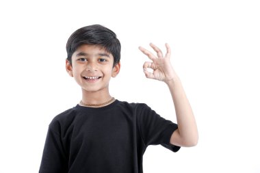 Indian child showing nice gesture with hand
