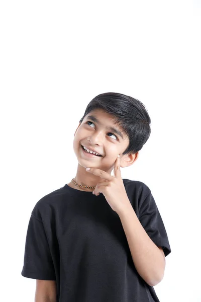 Cute Indian Boy Thinking Idea Looking Isolated White Background — стоковое фото