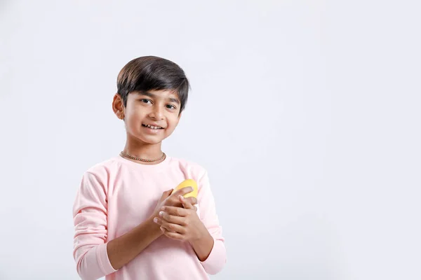 Cute Indian Asian Little Boy Eating Mango Multiple Expressions Isolated — Stock fotografie