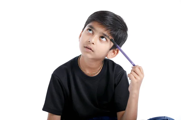 Cute Indian Boy Thinking Idea Looking Isolated White Background Imagen De Stock