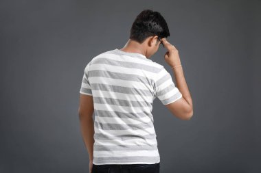 Young Indian man in tension