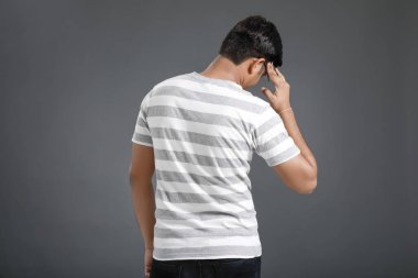 Young Indian man in tension