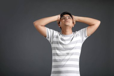 Young Indian man in tension