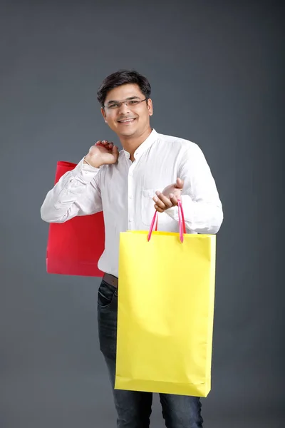 Young Indian Man Shopping Bags — ストック写真