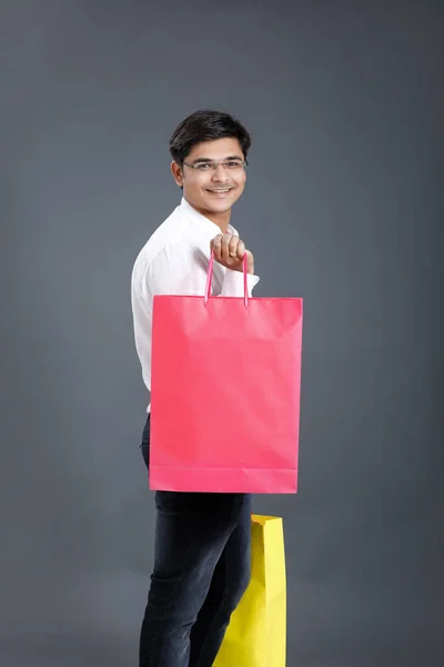 Young Indian Man Shopping Bags — ストック写真