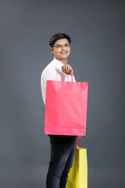 Young Indian Man Shopping Bags — ストック写真