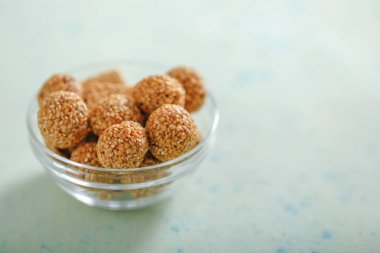 Pile of handmade Tilgul Laddu , sesame seeds for Makar Sankranti festival,