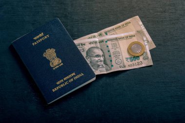 Indian passport with indian currency 