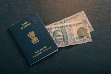 Indian passport with indian currency 