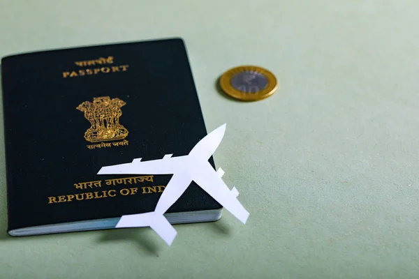 travel concept , Indian passport with paper airplane