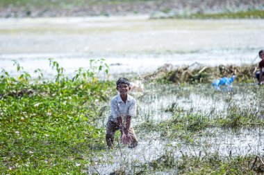 Jalgaon, India - January 10, 2016: Rural Indian Child Playing in river