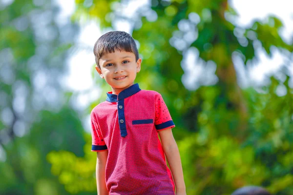 Cute Indian Little Boy Playing Outdoor — стоковое фото