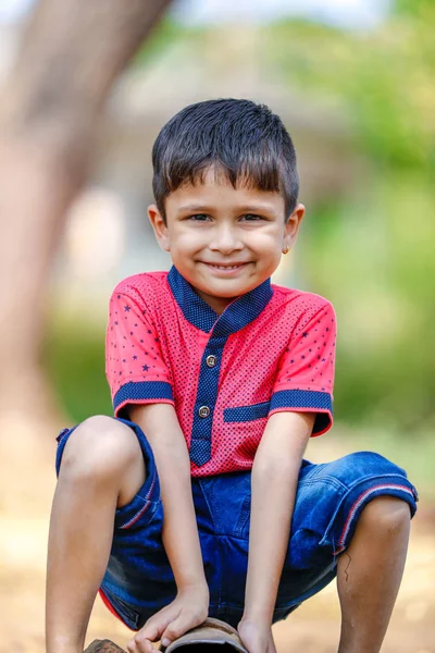 Cute Indian Little Boy Playing Outdoor — стоковое фото