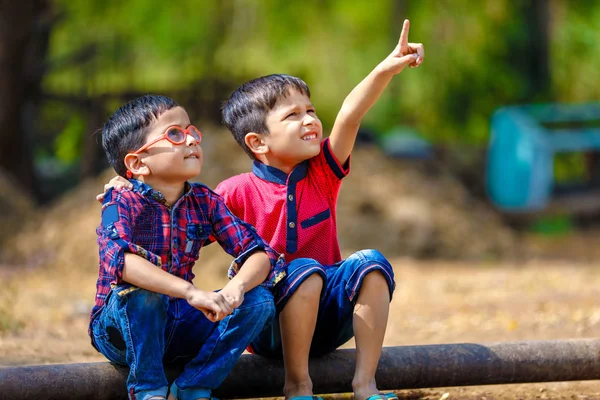 Cute Indian Little Boy Playing Outdoor ロイヤリティフリーのストック画像