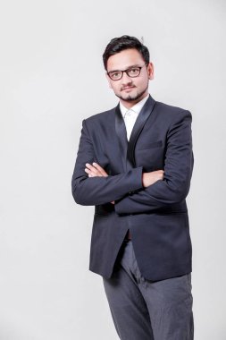 Young Indian / Asian businessman in suit