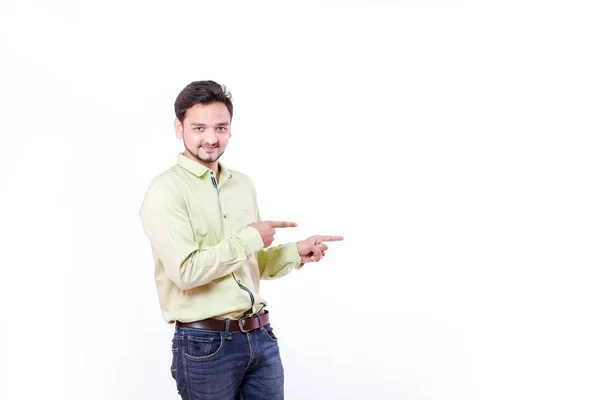 Young Indian Man Showing White Background — Stok Foto