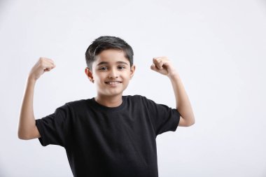 little Indian / Asian boy showing attitude over white background 
