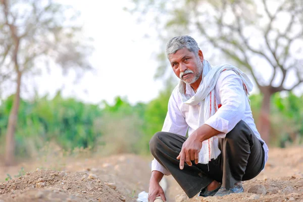 Indian Asian Farmer Checking Water Tube Field —  Fotos de Stock