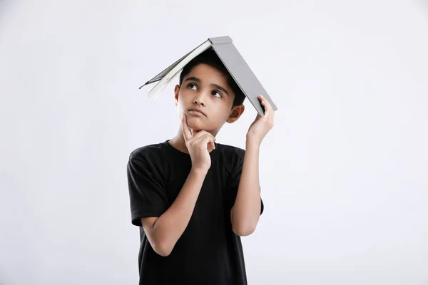 Little Indian Asian Boy Book Head Thinking Seriously — Stock fotografie