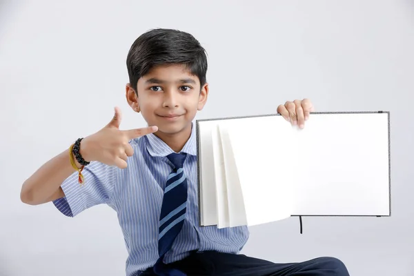 Cute Little Indian Asian School Boy Showing Note Book White — Fotografia de Stock