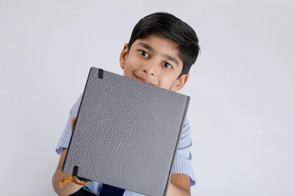 Cute Little Indian Asian School Boy Showing Note Book White — Fotografia de Stock