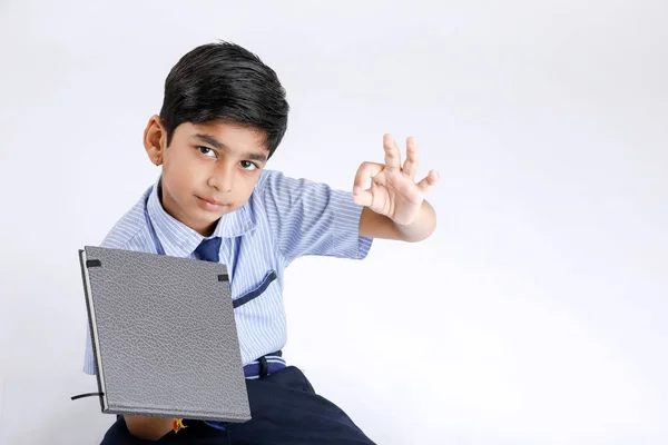 Cute Little Indian Asian School Boy Showing Note Book White — Fotografia de Stock