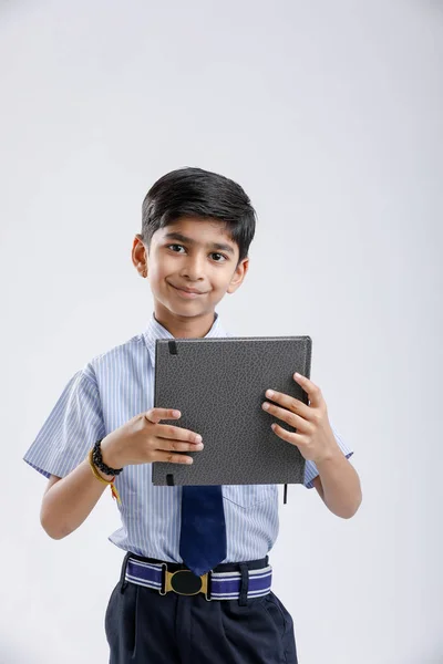 Cute Little Indian Asian School Boy Showing Note Book White — Stockfoto